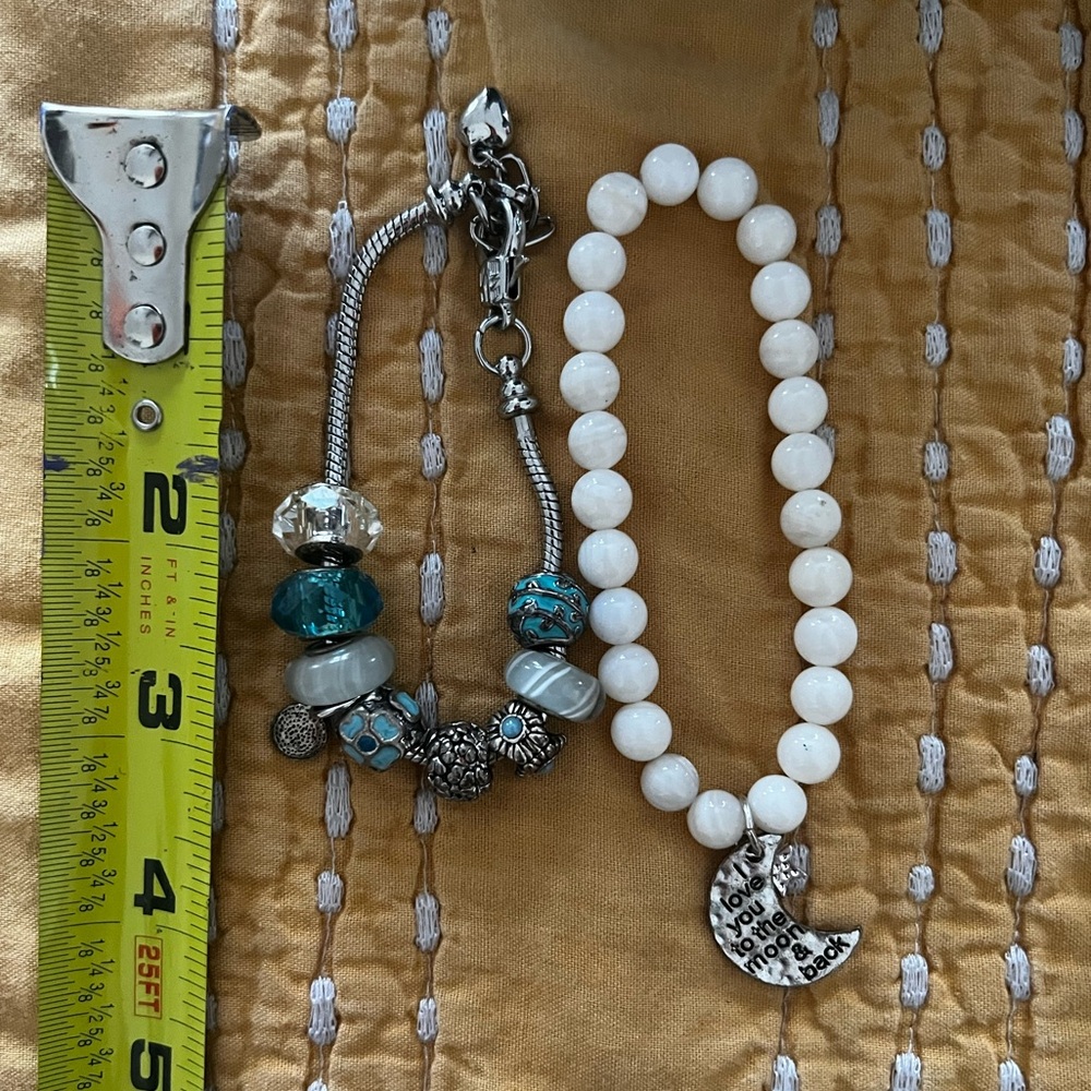 two small silver beaded bracelets